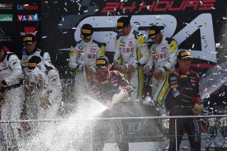 CHAMPAGNE CELEBRATION ON THE PODIUM | OLIVIER BEROUD / VISION SPORT AGENCY