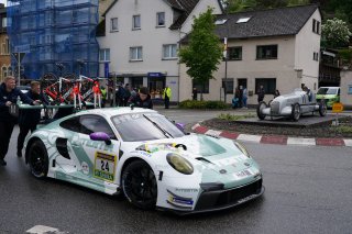 Laurin Heinrich, Laurens Vanthoor, Ricardo Feller, Lionspeed GP, nurburgring, adenau, public road, kerbs, cloudy, rainy, action, portrait, porsche 911 gt3 r, team crew, crowd, factor bikes, silver arrow statue, wide angle, close-up, focus, tension
 | Gruppe C Photography