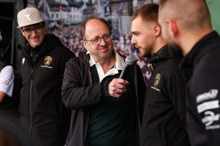 Patricija Stalidzane, Maximilian Paul, Christian Engelhart, Pave, Konrad Motorsport, paddock, hospitality area, cloudy, daylight, interview, portrait, lamborghini squadra corse, team crew, microphone, automobili lamborghini, close-up, shallow depth of fie | Gruppe C Photography