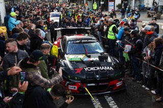 Marco Wittmann, Philipp Eng, Charles Weerts, Robin Frijns, Schubert Motorsport, adenau, nurburgring, city street, cloudy, portrait, fan interaction, bmw m4 gt3, crowd, yokohama, gran turismo, team crew, wide angle, high angle, excitement, focus
 | Gruppe C Photography